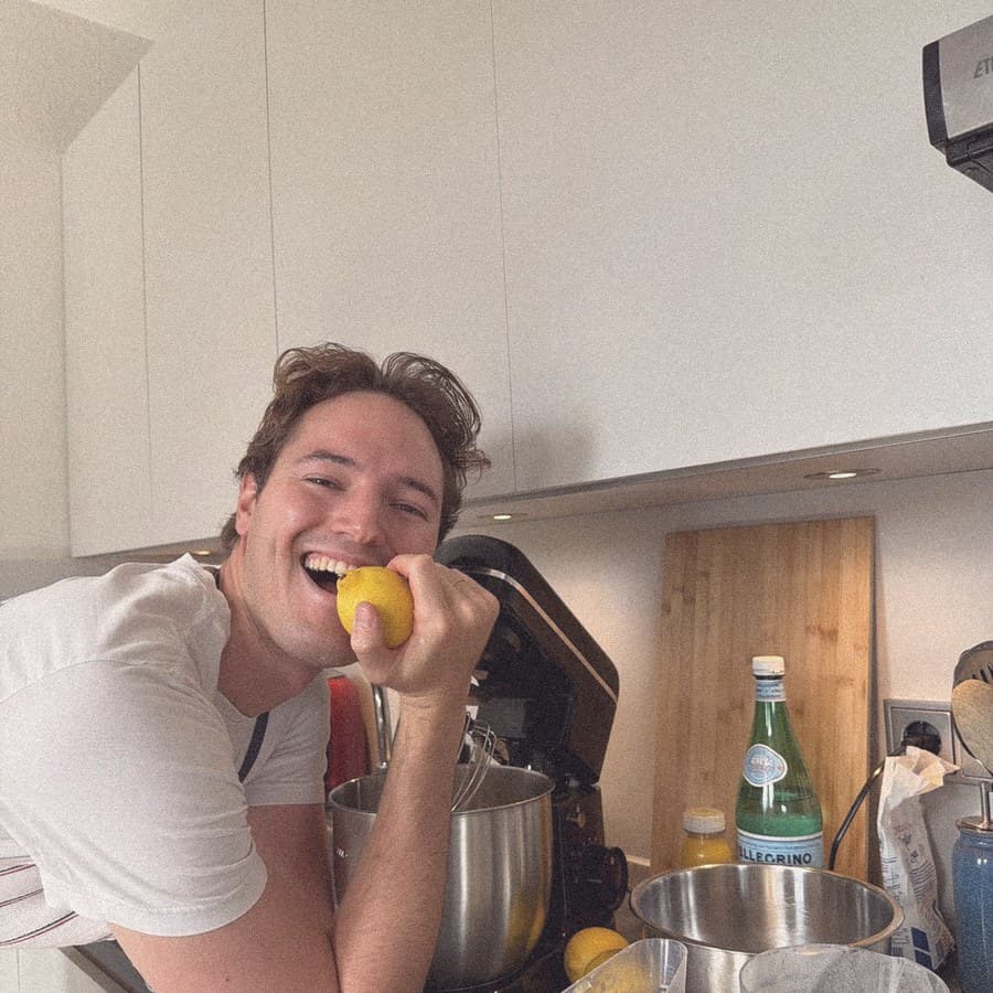 Zach at the mixer with a lemon