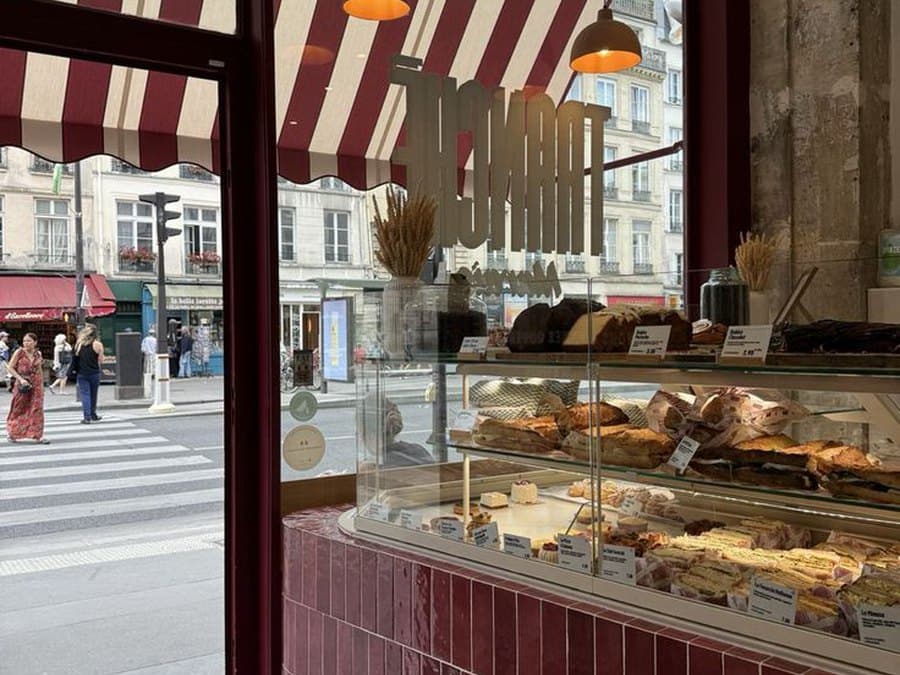 A striped bakery awning on a corner