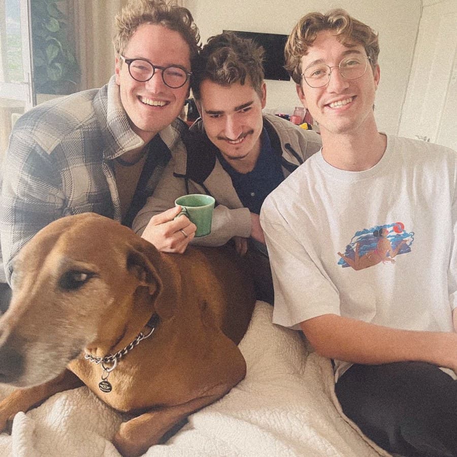 Friends at home with the dog