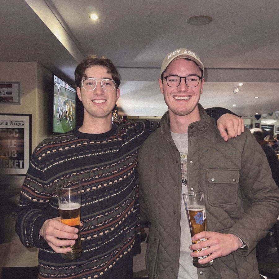Two friends with a beer